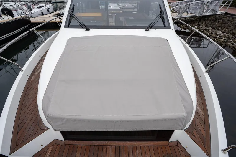  Yacht Photos Pics 2021 Sealine F430 yacht with covered deck area, docked at marina.