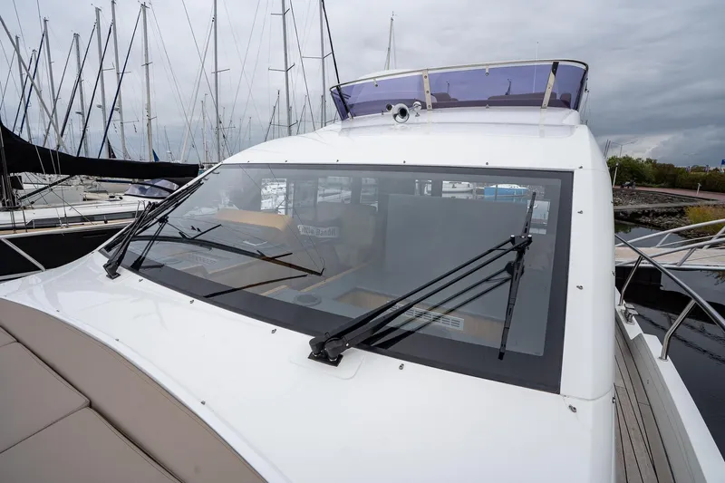  Yacht Photos Pics 2021 Sealine F430 yacht with sleek design, docked in a marina.