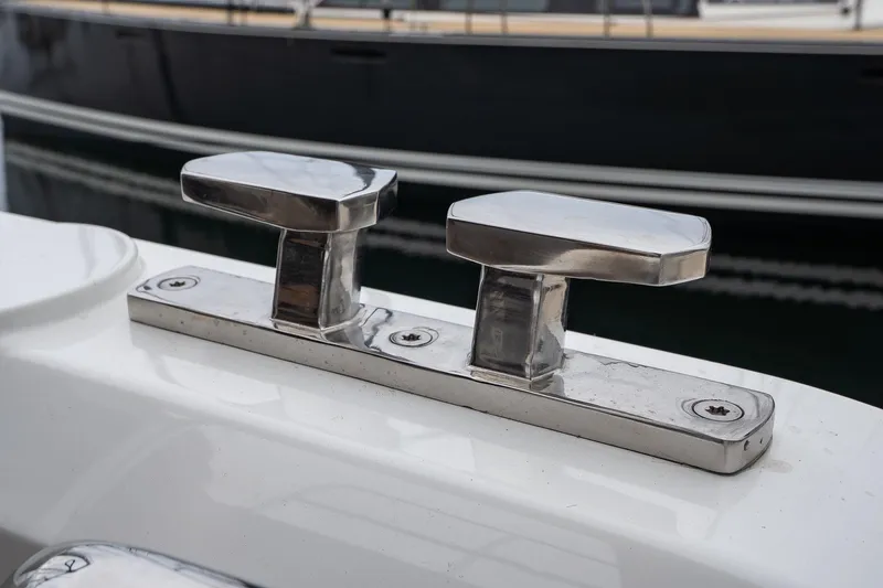  Yacht Photos Pics Chrome cleats on a 2021 Sealine F430 yacht, docked at a marina.