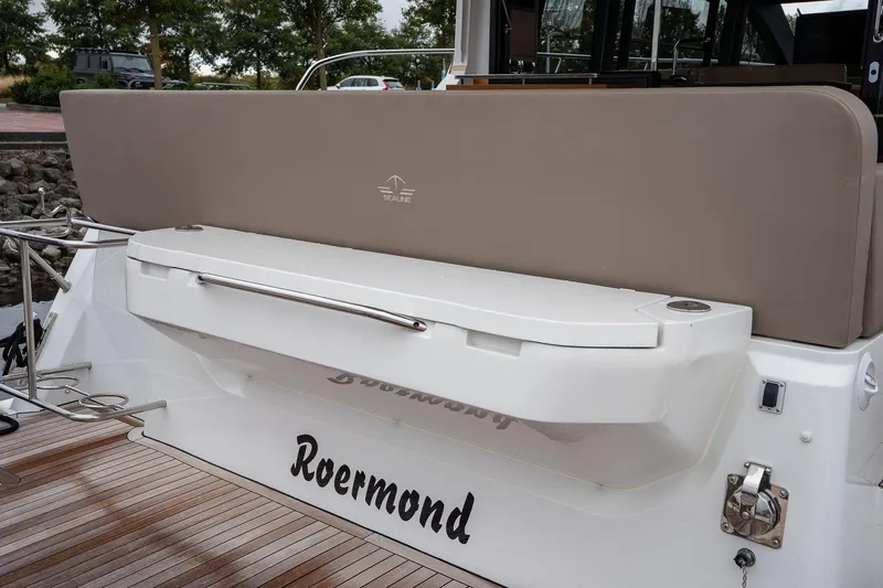  Yacht Photos Pics 2021 Sealine F430 yacht stern with teak deck and sleek design elements.