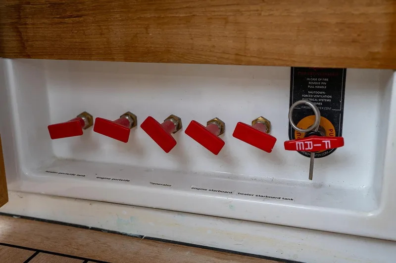  Yacht Photos Pics Control panel with red switches on a 2021 Sealine F430 yacht.