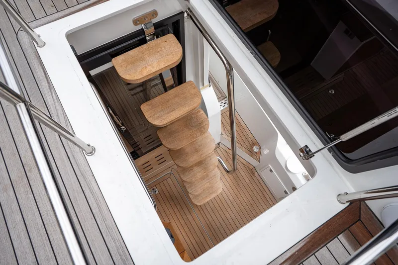  Yacht Photos Pics Staircase leading below deck on 2021 Sealine F430 yacht, featuring wooden steps and sleek design.