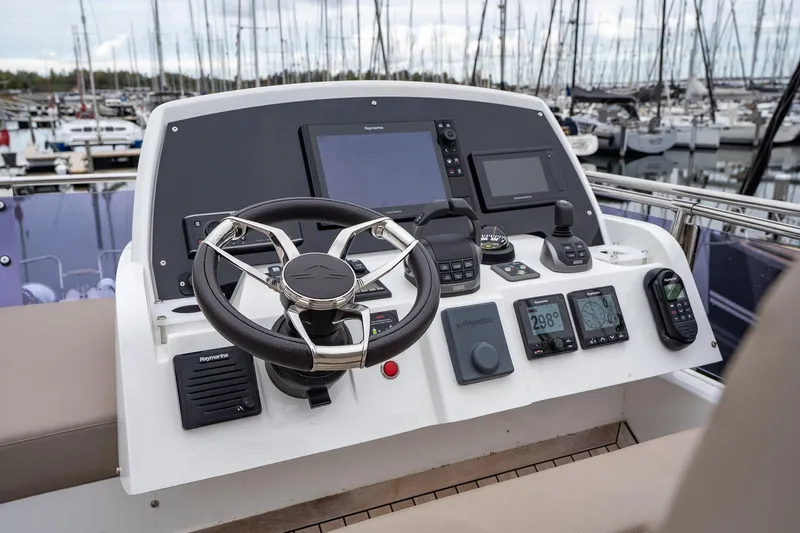  Yacht Photos Pics Control panel of a 2021 Sealine F430 yacht, featuring advanced navigation equipment.