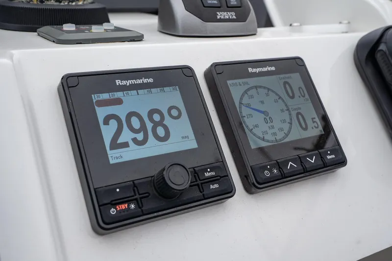  Yacht Photos Pics Raymarine navigation displays on 2021 Sealine F430 yacht dashboard, showing heading and depth.