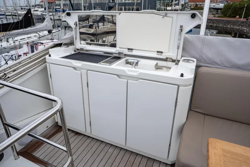  Yacht Photos Pics Outdoor kitchenette on 2021 Sealine F430 yacht with grill and sink.