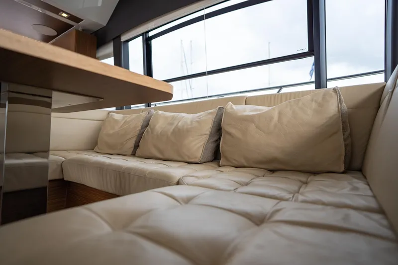  Yacht Photos Pics Luxurious interior seating of 2021 Sealine F430 yacht with plush cushions.
