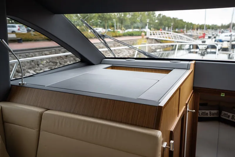  Yacht Photos Pics Interior of 2021 Sealine F430 yacht, featuring sleek wood cabinetry and modern design elements.