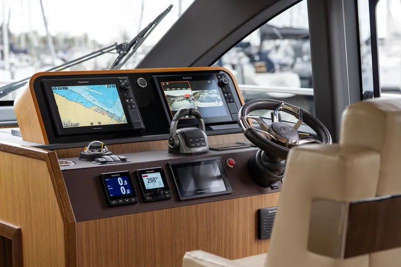  Yacht Photos Pics Helm of 2021 Sealine F430 yacht with advanced navigation displays and controls.