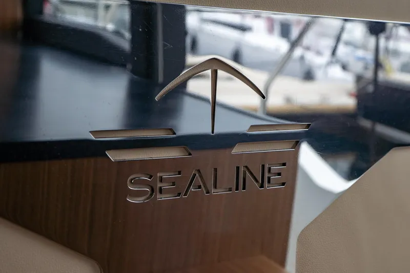  Yacht Photos Pics 2021 Sealine F430 yacht logo on sleek interior panel.