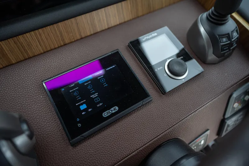  Yacht Photos Pics Control panel of 2021 Sealine F430 yacht with touchscreen and joystick.