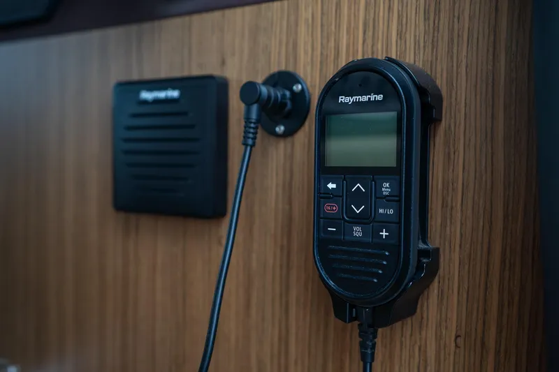  Yacht Photos Pics Raymarine marine radio on 2021 Sealine F430 yacht's wooden interior panel.