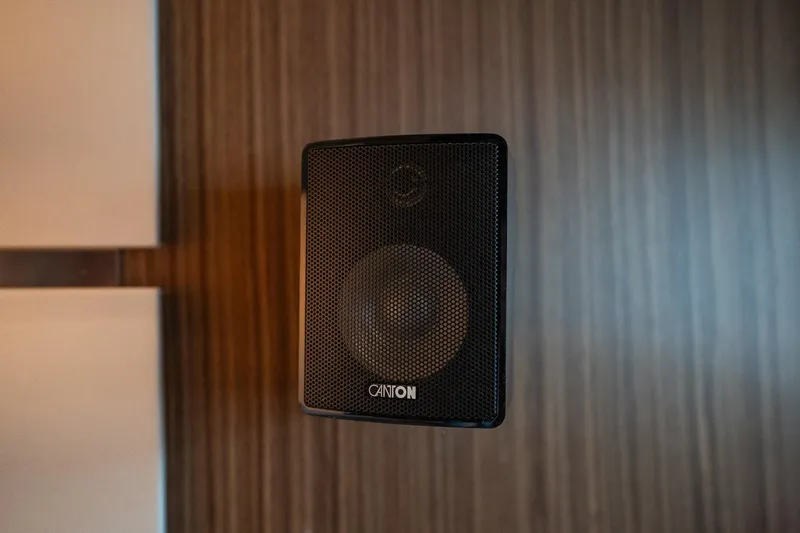  Yacht Photos Pics Wall-mounted Canton speaker on Sealine F430 yacht, 2021 model, with wood panel background.