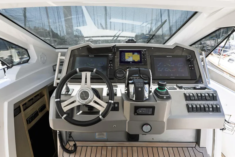 Loki Yacht Photos Pics Cockpit of 2018 Azimut Verve 40 yacht with modern navigation controls and steering wheel.