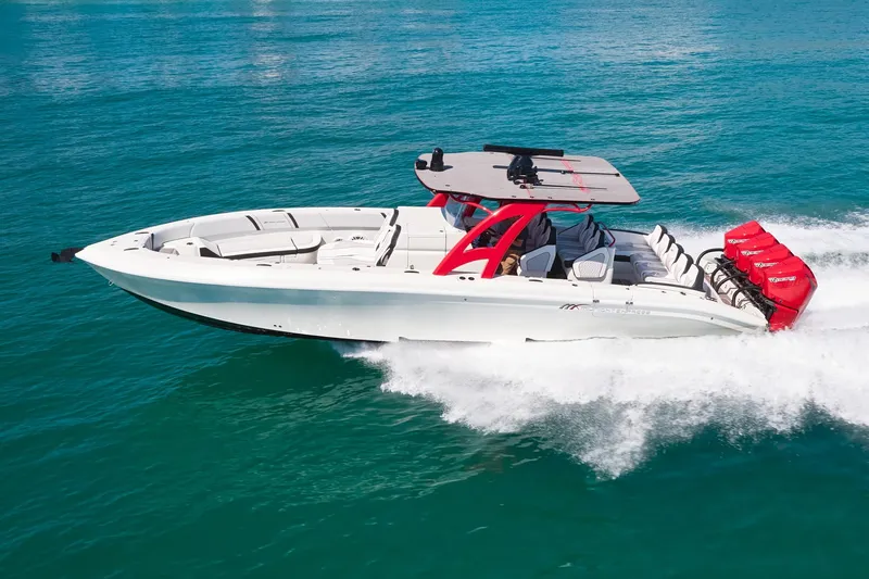  Yacht Photos Pics 2025 Midnight Express 37' Open boat cruising on clear blue water.