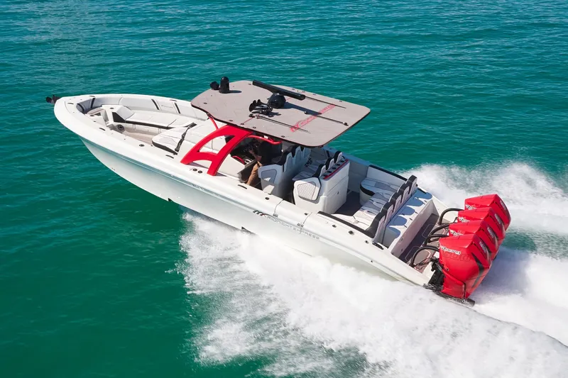  Yacht Photos Pics 2025 Midnight Express 37' Open boat speeding on clear blue water.