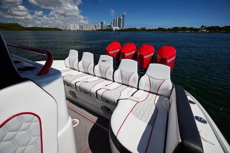  Yacht Photos Pics 2025 Midnight Express 37' Open boat with luxurious seating and powerful engines on a scenic waterway.