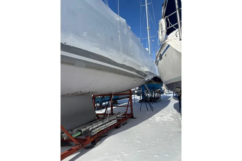 Spellbound Yacht Photos Pics Beneteau Oceanis Yacht 54, 2022 model, stored on stands in snowy conditions.