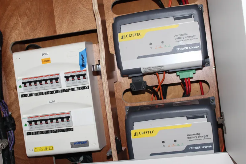 Spellbound Yacht Photos Pics Electrical panel and battery chargers on 2022 Beneteau Oceanis Yacht 54.