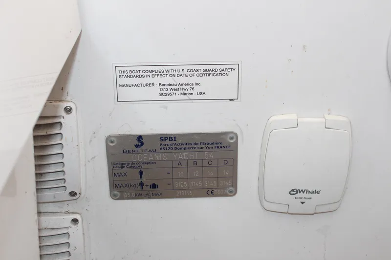 Spellbound Yacht Photos Pics 2022 Beneteau Oceanis Yacht 54 compliance and specifications plate with Whale bilge pump.