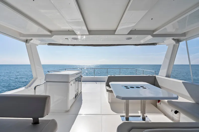 Closer To The Sun Yacht Photos Pics Luxurious 2025 Leopard 53 Powercat yacht interior with ocean view.