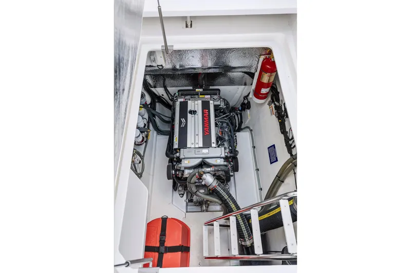Closer To The Sun Yacht Photos Pics Engine compartment of 2025 Leopard 53 Powercat with Yanmar engine and safety equipment.