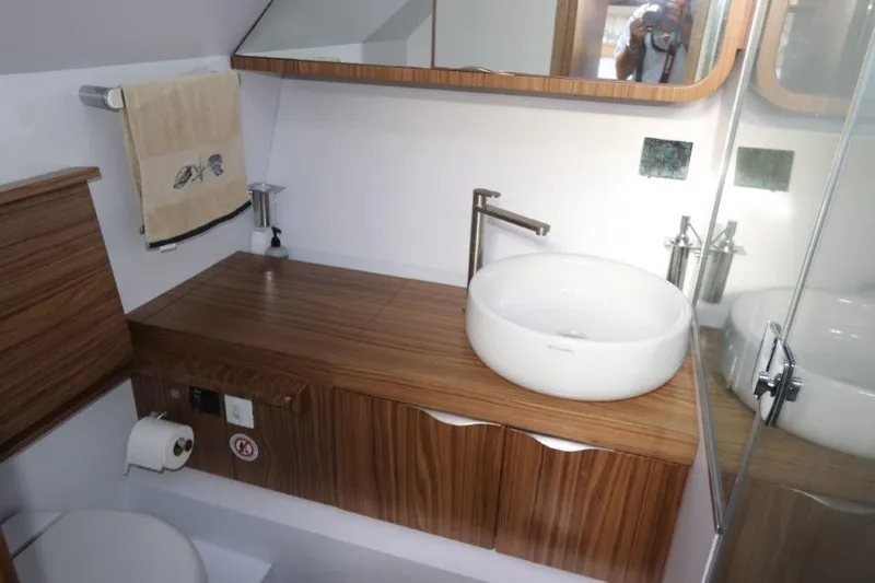  Yacht Photos Pics Modern bathroom in 2018 Canados Gladiator 428 yacht with wooden vanity and vessel sink.