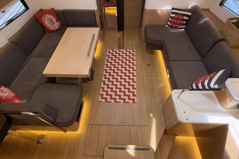  Yacht Photos Pics Luxurious interior of a 2019 Amel 50 yacht with modern seating and stylish decor.