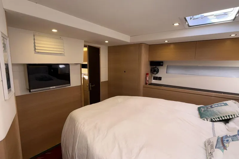  Yacht Photos Pics Luxurious cabin interior of a 2019 Amel 50 yacht with modern amenities.