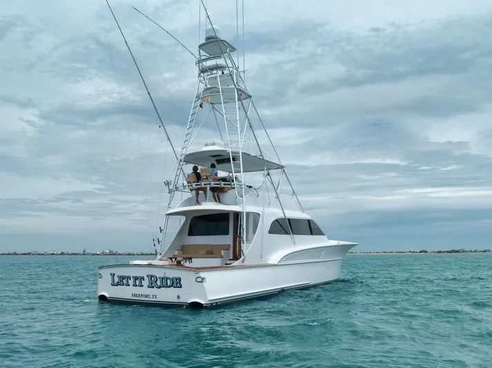 Let It Ride Yacht Photos Pics 2008 Sculley Custom Carolina yacht on open water under cloudy sky.