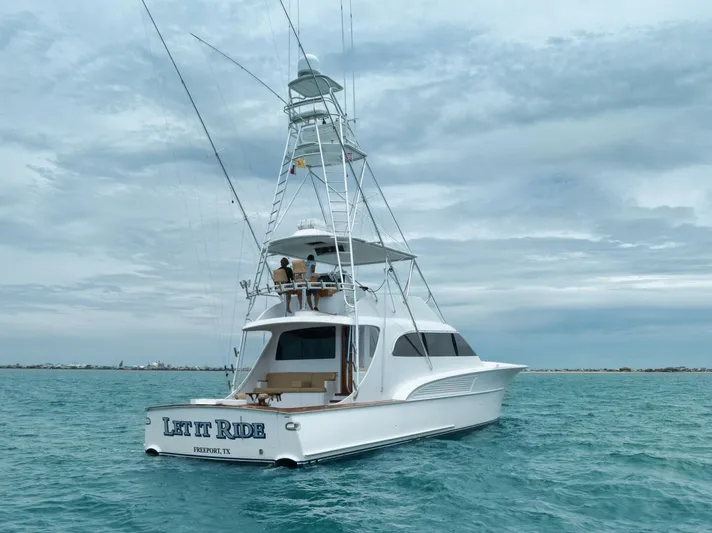Let It Ride Yacht Photos Pics 2008 Sculley Custom Carolina yacht on open water under cloudy sky.