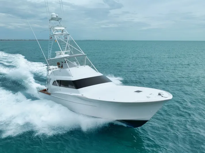 Let It Ride Yacht Photos Pics 2008 Sculley Custom Carolina yacht cruising on open sea, showcasing sleek design and speed.