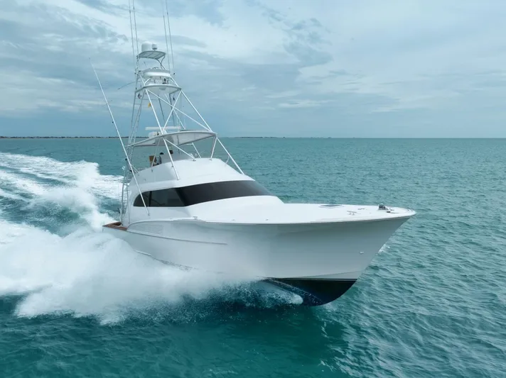 Let It Ride Yacht Photos Pics 2008 Sculley Custom Carolina yacht cruising on open sea under cloudy sky.