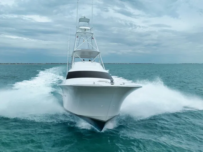 Let It Ride Yacht Photos Pics 2008 Sculley Custom Carolina yacht cruising on open water under cloudy skies.