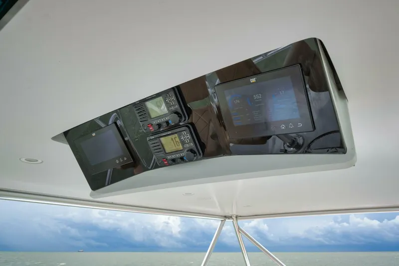 Let It Ride Yacht Photos Pics 2008 Sculley Custom Carolina boat dashboard with navigation screens and controls.