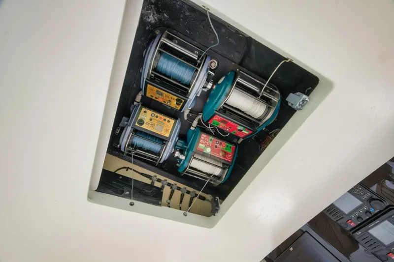 Let It Ride Yacht Photos Pics Fishing reels mounted on a 2008 Sculley Custom Carolina boat ceiling.