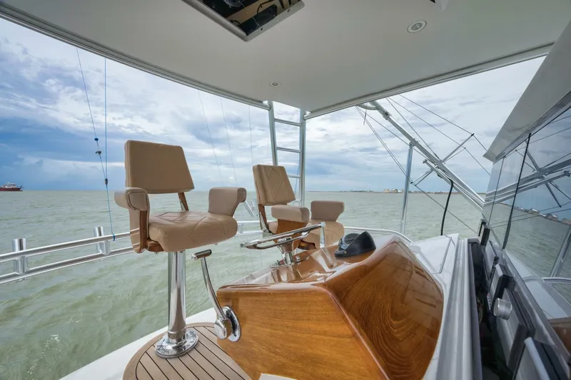 Let It Ride Yacht Photos Pics 2008 Sculley Custom Carolina yacht helm with leather seats and ocean view.