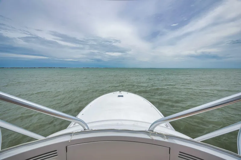 Let It Ride Yacht Photos Pics Bow view of 2008 Sculley Custom Carolina boat on open water under cloudy sky.