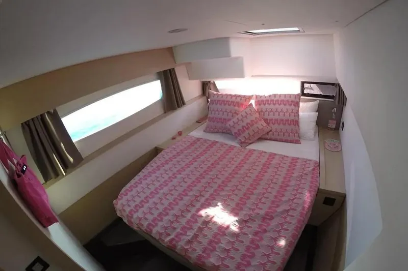 Xclip Yacht Photos Pics Luxurious cabin interior of 2015 Fountaine Pajot SABA 50 with pink bedding.
