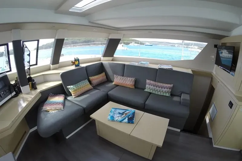 Xclip Yacht Photos Pics Luxurious interior of 2015 Fountaine Pajot SABA 50 catamaran with ocean view.