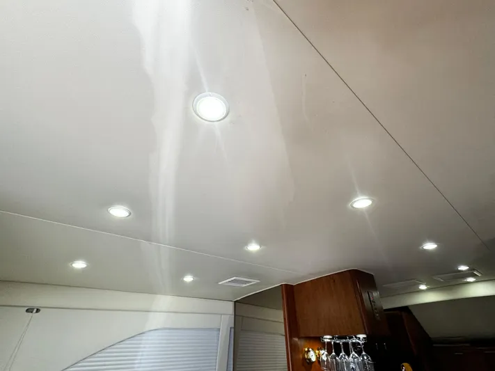 Sweet Melissa Yacht Photos Pics Ceiling lights in 1992 Ocean Yachts 48 Convertible interior.
