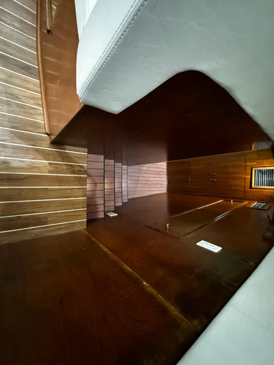 Sweet Melissa Yacht Photos Pics Interior of 1992 Ocean Yachts 48 Convertible with wooden flooring and seating.