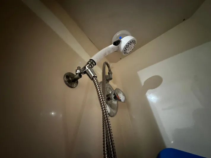 Sweet Melissa Yacht Photos Pics Shower fixture in 1992 Ocean Yachts 48 Convertible boat bathroom.