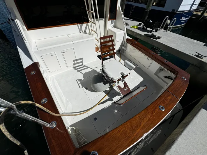 Sweet Melissa Yacht Photos Pics 1992 Ocean Yachts 48 Convertible fishing deck with chair and rod holders.