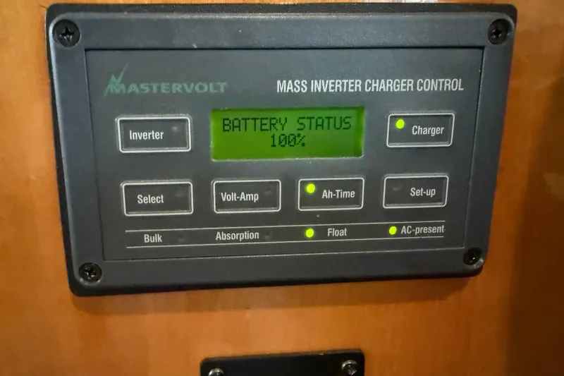  Yacht Photos Pics Mastervolt inverter charger control panel on 2000 Novatec Cockpit Motor Yacht, showing 100% battery status.