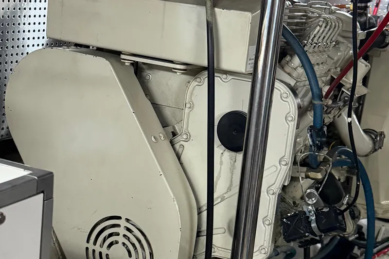  Yacht Photos Pics Engine room of a 2000 Novatec Cockpit Motor Yacht, showcasing mechanical components.