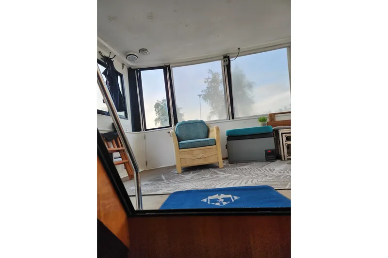  Yacht Photos Pics Interior of 2000 Novatec Cockpit Motor Yacht with seating and large windows.