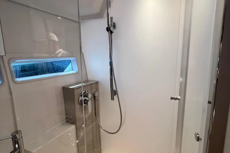  Yacht Photos Pics Modern shower area in 2025 Nimbus 495 Flybridge yacht bathroom.