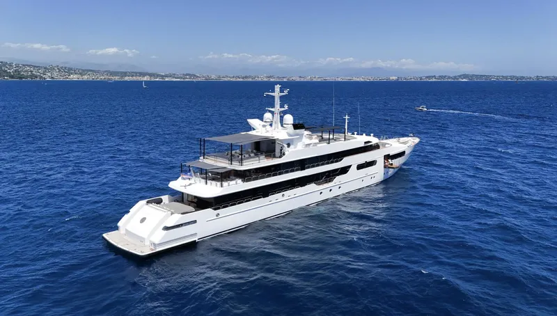 Magna Grecia Yacht Photos Pics Luxurious 1986 Custom Elsflether Werft yacht cruising on open blue sea.