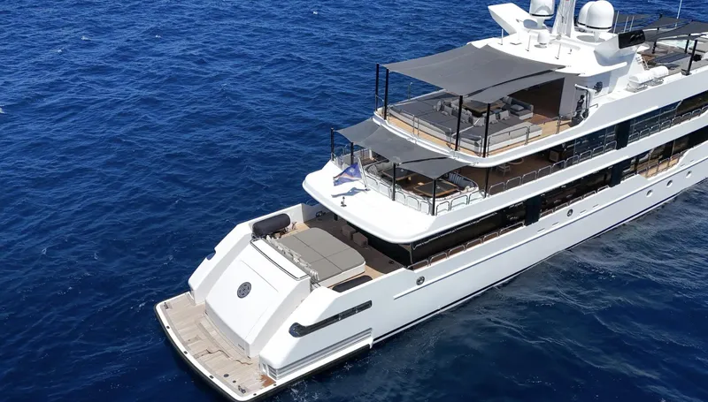 Magna Grecia Yacht Photos Pics Luxurious 1986 Custom Elsflether Werft yacht cruising on deep blue ocean waters.