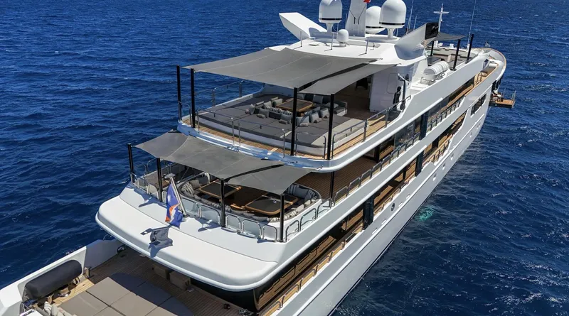 Magna Grecia Yacht Photos Pics Luxurious 1986 Elsflether Werft custom yacht cruising on open blue sea.